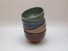 Thumbnail: Mini Bowl; 
          Color: Blue, Green, Oatmeal, Rust; 
          Size: 4.25&rdquo; x 4.25&rdquo; x 2.5&rdquo; 
          $12.00 each.