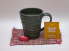 Thumbnail: Peace Mug; 
          Color: Green, Blue; 
          Size: 4&rdquo; x 4&rdquo; x 5&rdquo;
          $20.00 each.
